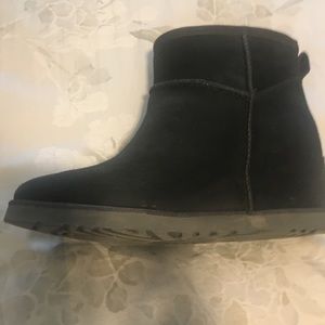Black ankle UGG Boots.